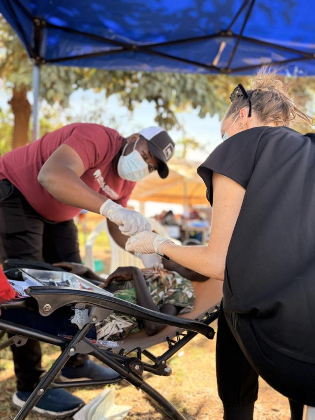 Treatment under the outreach tent