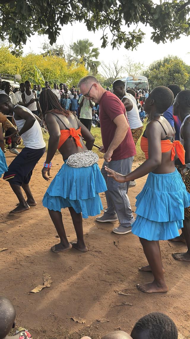 Dancing together at the end of an outreach